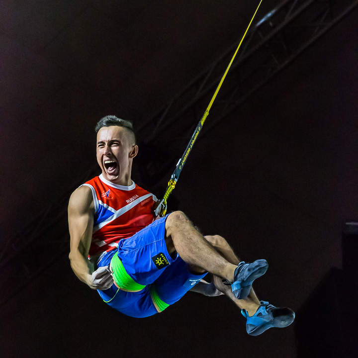 speed climber celebrating after a win during the 2018 world climbing championships